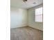 A bedroom features neutral walls, carpeting, and natural light at 8793 Candelabra Ct, Las Vegas, NV 89148