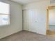 This bedroom features neutral walls and a large closet at 8793 Candelabra Ct, Las Vegas, NV 89148