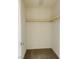 Empty walk-in closet with carpeted floor and simple shelf at 8793 Candelabra Ct, Las Vegas, NV 89148
