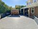 Serene backyard featuring a modern outdoor spa, covered patio, and well-maintained landscaping at 8931 Lansberry Ct, Las Vegas, NV 89147
