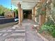 Charming outdoor space with spa, covered patio, and blooming plants for a relaxing experience at 8931 Lansberry Ct, Las Vegas, NV 89147