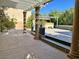 Spacious backyard patio with outdoor spa and elegant pergola perfect for outdoor gatherings at 8931 Lansberry Ct, Las Vegas, NV 89147