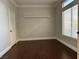 Cozy bedroom with hardwood floors, a large window and ample natural light at 8931 Lansberry Ct, Las Vegas, NV 89147