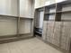 Walk-in closet with custom shelving and drawer units for optimal organization at 8931 Lansberry Ct, Las Vegas, NV 89147
