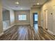 Upstairs living room has an open floor plan, hardwood floors and natural light at 8931 Lansberry Ct, Las Vegas, NV 89147
