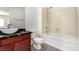 Stylish bathroom featuring modern fixtures and a separate tub and shower area at 9173 Weeping Hollow Ave, Las Vegas, NV 89178