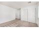 Clean bedroom featuring neutral carpet and a closet with sliding doors at 9173 Weeping Hollow Ave, Las Vegas, NV 89178