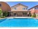 Enjoy the sparkling in-ground pool and patio in this home's backyard at 9173 Weeping Hollow Ave, Las Vegas, NV 89178