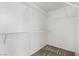 Spacious walk-in closet with ample shelving for organized storage at 9173 Weeping Hollow Ave, Las Vegas, NV 89178