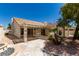 Great backyard featuring large patio, mature landscaping, and a pebble fountain at 9305 Hollycrest Dr, Las Vegas, NV 89117