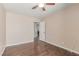 This is a bedroom with hardwood floor and a ceiling fan at 9305 Hollycrest Dr, Las Vegas, NV 89117