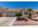 Charming single-story home with desert landscaping and a two-car garage at 9305 Hollycrest Dr, Las Vegas, NV 89117
