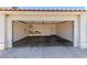 This is a two car garage that is empty, but ready for your cars or hobbies at 9305 Hollycrest Dr, Las Vegas, NV 89117