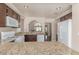 Spacious kitchen with granite countertops and stainless steel appliances at 9305 Hollycrest Dr, Las Vegas, NV 89117