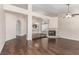 Bright living room with hardwood floors, fireplace, and neutral paint at 9305 Hollycrest Dr, Las Vegas, NV 89117