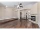 Expansive living room featuring hardwood flooring, fireplace, and ample space at 9305 Hollycrest Dr, Las Vegas, NV 89117
