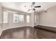 Spacious living room featuring hardwood flooring, large windows, and natural light at 9305 Hollycrest Dr, Las Vegas, NV 89117