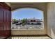 Balcony with metal railing overlooking parking and neighborhood buildings on a sunny day at 950 Seven Hills Dr # 1624, Henderson, NV 89052