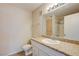 Well-lit bathroom featuring a granite-topped vanity, modern fixtures, and a shower at 950 Seven Hills Dr # 1624, Henderson, NV 89052