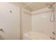 Clean bathroom featuring a shower and tub with white tile walls and neutral trim at 950 Seven Hills Dr # 1624, Henderson, NV 89052