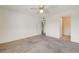 Spacious bedroom with neutral colored walls and carpet, with two doorways at 950 Seven Hills Dr # 1624, Henderson, NV 89052