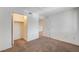 Cozy bedroom with plush carpeting, a closet with lighting, and neutral color walls at 950 Seven Hills Dr # 1624, Henderson, NV 89052
