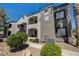 Beautiful condo exterior showcasing stucco walls, balconies, and well-maintained landscaping at 950 Seven Hills Dr # 1624, Henderson, NV 89052
