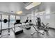 Community gym with modern exercise equipment and ample natural light at 950 Seven Hills Dr # 1624, Henderson, NV 89052