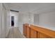 Hallway featuring wood floors and access to other rooms at 1025 Clover Tip Ct, Las Vegas, NV 89123