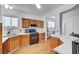 Efficient kitchen featuring wood cabinetry and stainless steel oven with ample counter space at 1025 Clover Tip Ct, Las Vegas, NV 89123