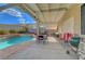 Outdoor haven with pool, spa, patio, and BBQ, ideal for entertainment and relaxation at 1025 Clover Tip Ct, Las Vegas, NV 89123