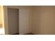 Bedroom closet offering ample storage space with sliding doors and a clothing rod at 10371 Calypso Cave St, Las Vegas, NV 89141