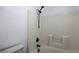 Bathroom with a tub and a tiled shower featuring a shower head at 1069 Coronado Peak Ave, Las Vegas, NV 89183
