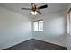 Bedroom featuring wood-look flooring, a ceiling fan, and natural light at 1069 Coronado Peak Ave, Las Vegas, NV 89183