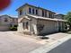 Two-story home featuring a two-car garage, tile roof, and covered entryway in a suburban neighborhood at 1069 Coronado Peak Ave, Las Vegas, NV 89183