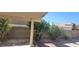 Covered patio with desert landscaping, perfect for enjoying the outdoors at 1325 Fiesta Grande Ct, North Las Vegas, NV 89031