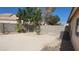 The expansive backyard is enclosed by a block wall, with desert landscaping at 1325 Fiesta Grande Ct, North Las Vegas, NV 89031