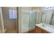 A functional bathroom featuring a shower-tub and a single vanity at 1325 Fiesta Grande Ct, North Las Vegas, NV 89031