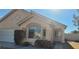 Charming single-story home with arched window, desert landscaping, and a well-maintained front yard at 1325 Fiesta Grande Ct, North Las Vegas, NV 89031
