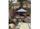 Backyard scene featuring a play area with a canopy, set for fun outdoor activities at 1355 Grass Creek Ave # 1, Henderson, NV 89012