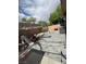 Spacious backyard with paver patio and toys. Includes palm trees and greenery at 1355 Grass Creek Ave # 1, Henderson, NV 89012
