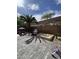 Paver backyard with a block wall and various play structures at 1355 Grass Creek Ave # 1, Henderson, NV 89012