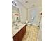 Neutral toned bathroom with a panda themed shower curtain and modern vanity at 1355 Grass Creek Ave # 1, Henderson, NV 89012