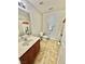 Neutral bathroom featuring a vanity with sink, toilet, and shower/tub with panda bear-themed shower curtain at 1355 Grass Creek Ave # 1, Henderson, NV 89012