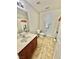 Bathroom featuring a sink vanity, toilet, and a panda-themed shower curtain at 1355 Grass Creek Ave # 1, Henderson, NV 89012