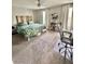 Bright bedroom with a floral comforter and modern decor at 1355 Grass Creek Ave # 1, Henderson, NV 89012