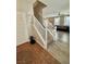 Foyer features tiled flooring, coat closet, and staircase leading to the main level at 1355 Grass Creek Ave # 1, Henderson, NV 89012