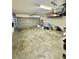 Large garage space, with a grey floor, for parking and storage at 1355 Grass Creek Ave # 1, Henderson, NV 89012