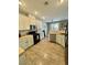 Spacious kitchen features white cabinets, modern appliances, and ample counter space at 1355 Grass Creek Ave # 1, Henderson, NV 89012