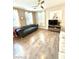 Bright and airy living room with hardwood floors and lots of natural light at 1355 Grass Creek Ave # 1, Henderson, NV 89012